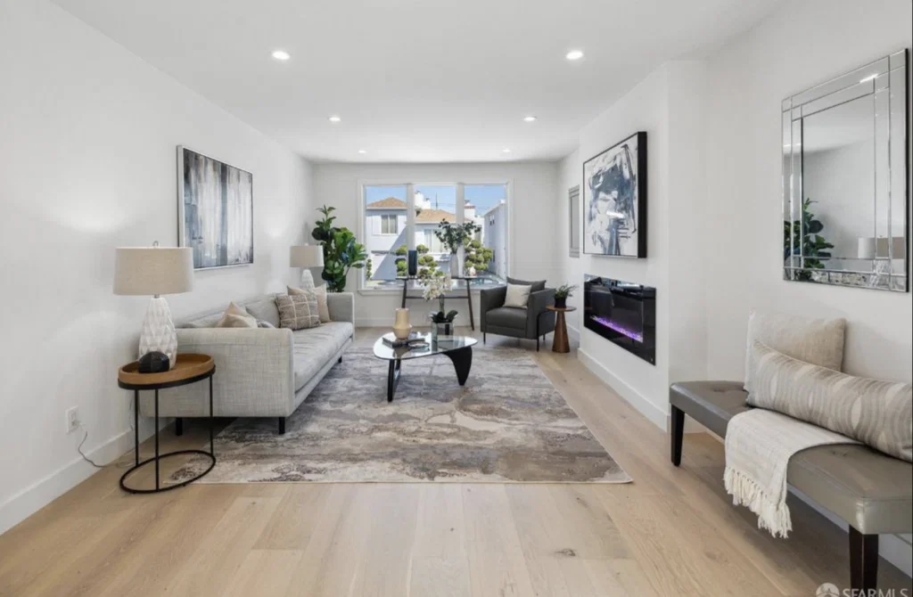 Professional home staging services transforming an empty San Francisco living room with modern furniture